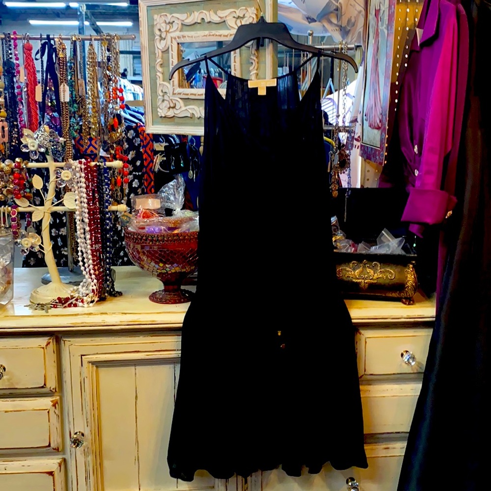 Black Michael Kors short pleaded bottom.